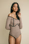 Brown, long sleeve, offshoulder bodysuit has contrasting draw detail on front.