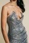 Shiny, grey color, sequin, long dress has on front cross over, rhinestone straps details.