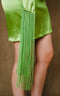 Silky, cocktail dress has wrapping one shoulder drape.