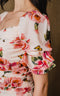 Mini, flower print, princess shoulder sleeve has front button up.