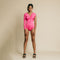 Pink, one arm, long sleeve, ruched on chest bodysuit.