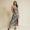 Shiny, grey color, sequin, long dress has on front cross over, rhinestone straps details.